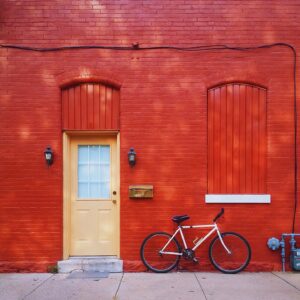 bicycle and red building