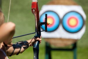 This is archery class and target practice archer shooting a target